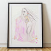 Framed artwork of a woman with long hair and a pink scarf on a white wall.